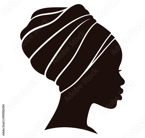 Silhouette of a woman wearing a headwrap in profile view from the side
