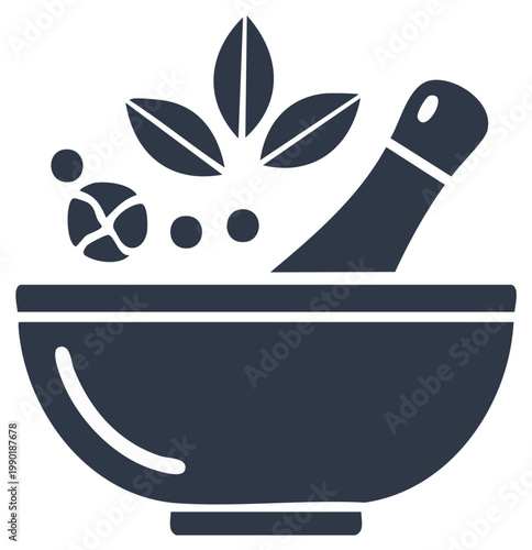 Mortar and pestle grinding fresh herbs and natural spices for wellness and alternative medicine