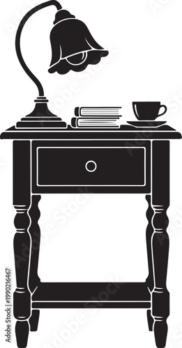 Black and white of a nightstand with a lamp books