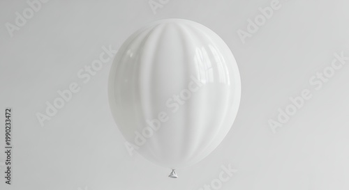 White Balloon Floating in a Minimalist, Bright Environment.