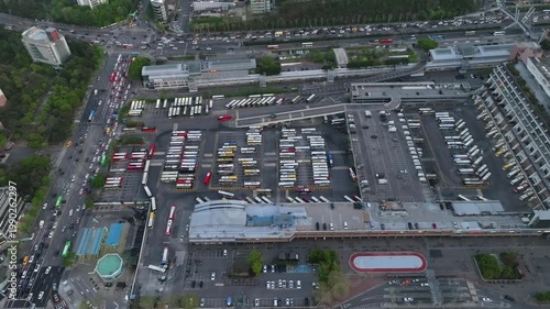 Aerial view of Seoul Express Bus Terminal at sunset with heavy traffic and city lights, Gangnam, South Korea.