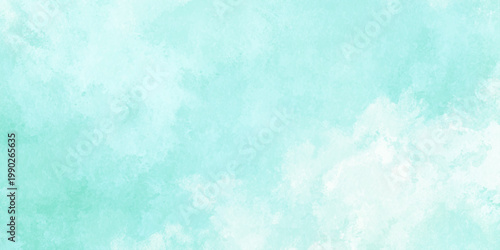 Soft mint green watercolor textured background with white clouds and subtle gradient effect for design and branding purposes