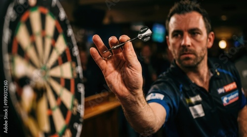 Precision and Focus: A professional darts player in mid-throw, embodies skill and determination as he aims for a bullseye. The ambiance of a pub, hints at competition and leisure.