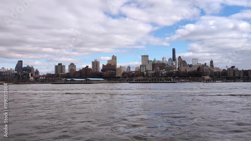 Cinematic New York City  waterfront showcasing iconic skyline, urban architecture, dramatic bridges, and vibrant metropolitan atmosphere, travel USA