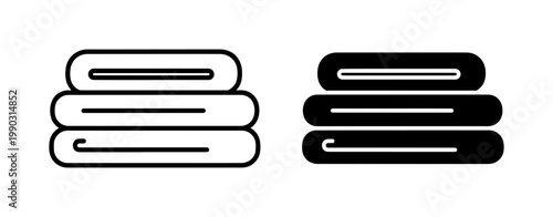 Stacked folded towel icons in outline and solid black style