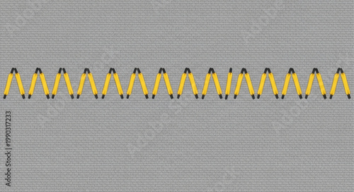 Many Surveyors Tools Lined Up on a Gray Surface.