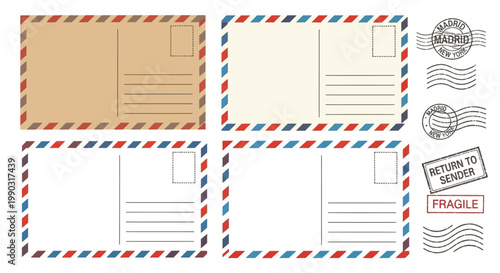 Multiple blank postcards with airmail borders and various vintage mailing stamps for travel or correspondence projects