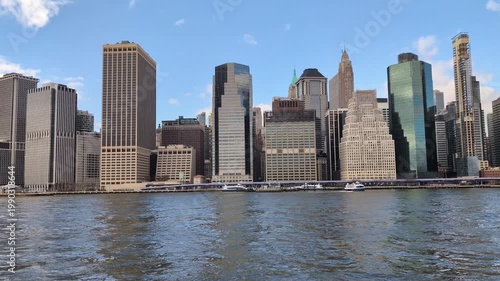 Cinematic New York City  waterfront showcasing iconic skyline, urban architecture, dramatic bridges, and vibrant metropolitan atmosphere, travel USA