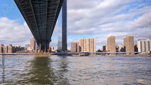 Cinematic New York City  waterfront showcasing iconic skyline, urban architecture, dramatic bridges, and vibrant metropolitan atmosphere, travel USA