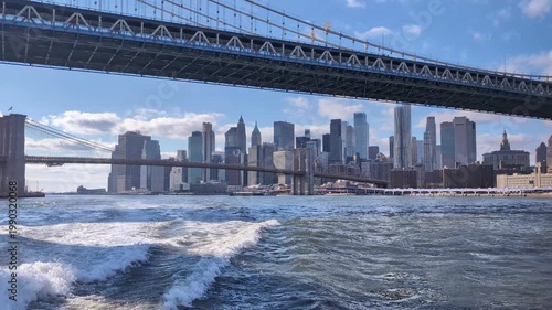 Cinematic New York City  waterfront showcasing iconic skyline, urban architecture, dramatic bridges, and vibrant metropolitan atmosphere, travel USA