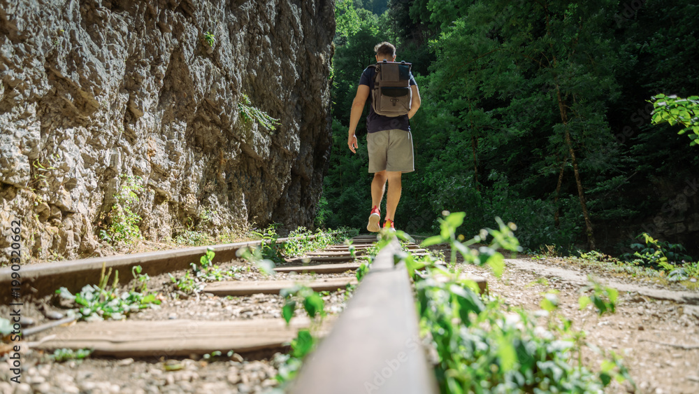 Fototapeta premium old railway without a train and without people in the forest in the mountains