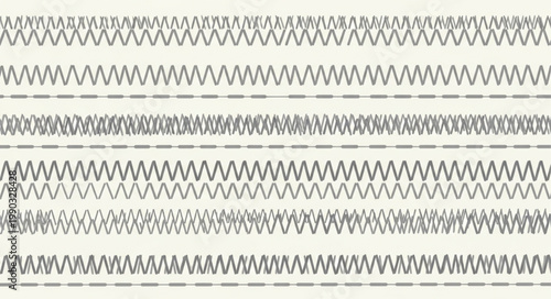 Close up of various sewing stitches on fabric.