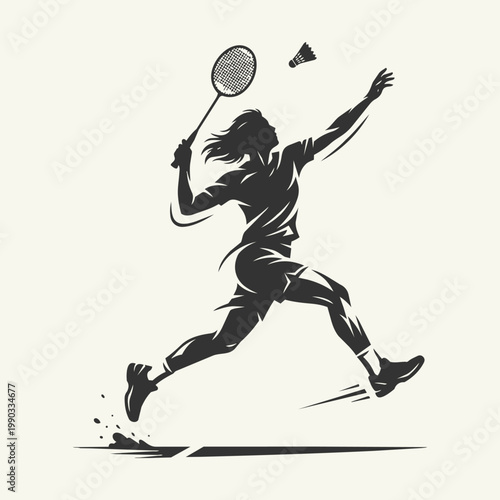 Silhouette of a badminton player hitting a shuttlecock during a match, dynamic pose
