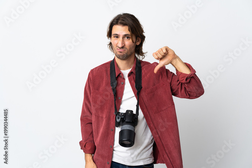 Photography Young photographer man isolated on white background showing thumb down with nega