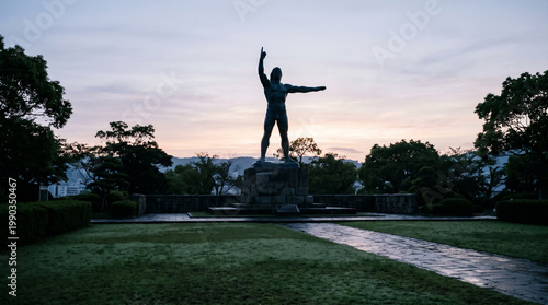 Silhouette Statue at Dusk in Park