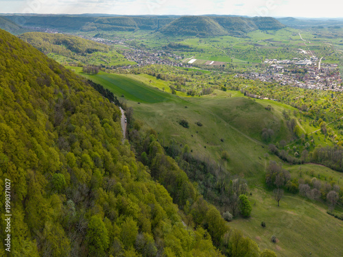 A flight above Kirchheim Teck towards the Castle Teck which is located high above the mountain 