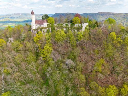 A flight above Kirchheim Teck towards the Castle Teck which is located high above the mountain 