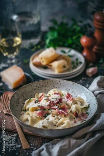 Creamy tortellini alla panna with diced ham and grated parmesan cheese