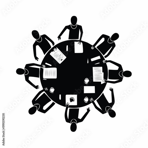 Strategic Session: A top-down monochrome view unveils a productive meeting, with professionals gathered around a circular table in a focused collaboration.