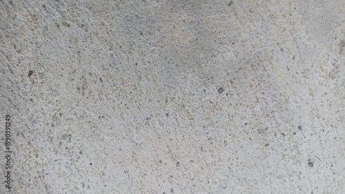 Concrete texture background rough gray cement surface with subtle scratches and grain, ideal for construction backdrop, industrial design, and grunge overlays