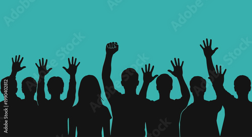 Group of people raising their hands.