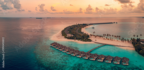 Tableau sur toile Breathtaking sunset Maldives island landscape luxury resort overwater houses cal
