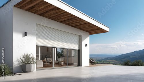 Modern home with large glass doors, outdoor patio, and mountain view, featuring window coverings and contemporary design