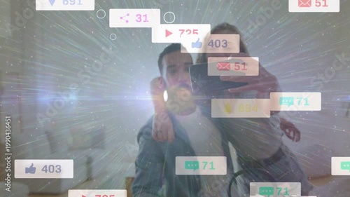 Couple taking mirror selfie in home, tap sparking phone sending growing heart icons for marketing