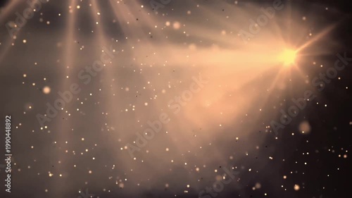 Shimmering golden light rays with floating bokeh particles and glowing lens flare in a seamless loop