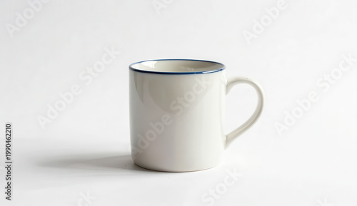 A steaming hot ceramic coffee mug sits isolated on a white background or a rustic wooden table, providing a blank porcelain object for a morning cafe breakfast beverage