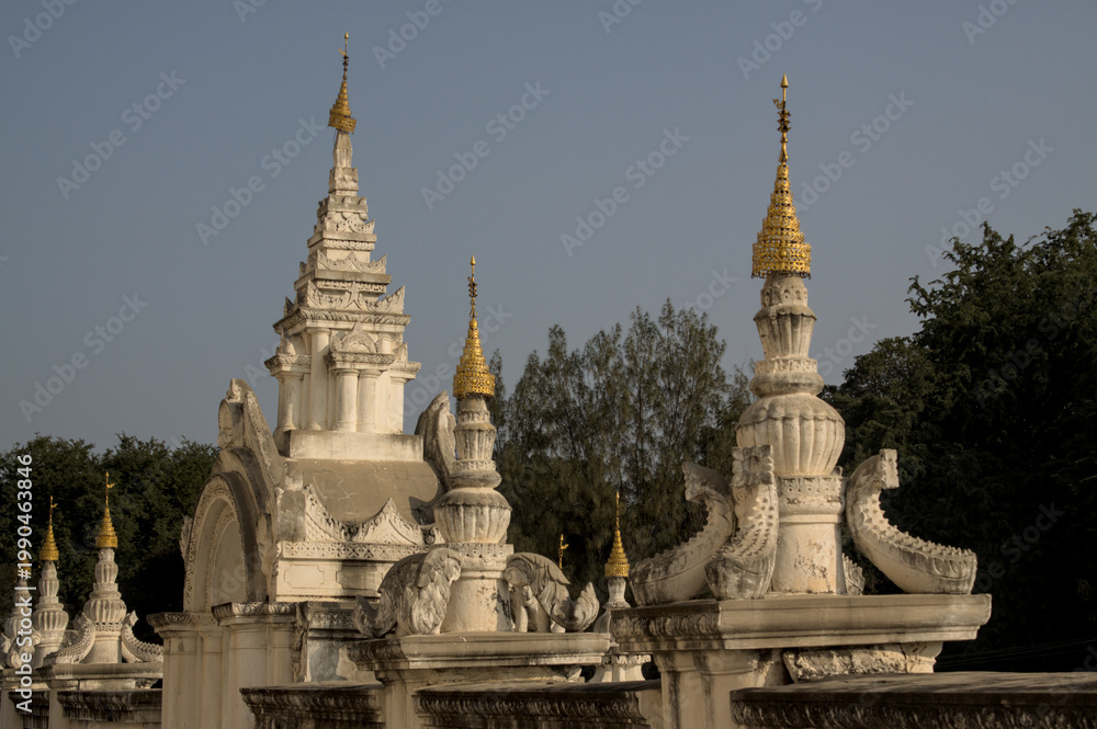 Fototapeta premium Kuthodaw Pagoda with white stupas in Mandalay, Myanmar