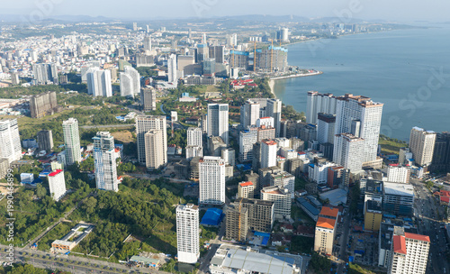 Fotografie The high-rise office buildings of Sihanoukville, a coastal city, are captured from a drone
