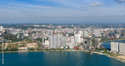 Fotografie The high-rise office buildings of Sihanoukville, a coastal city, are captured from a drone