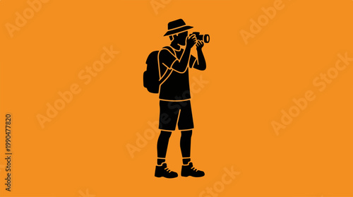 Silhouette of a photographer capturing a moment in nature with camera.