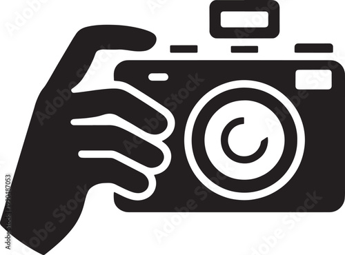 Black and white of a hand holding a with flash symbol