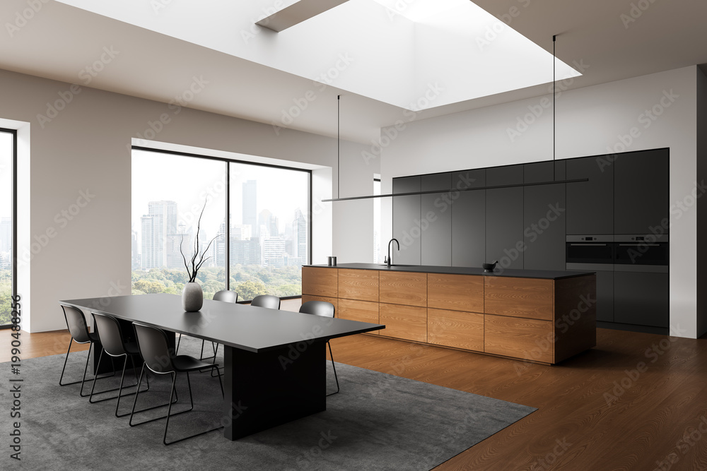 Obraz premium Modern minimalist kitchen interior with wooden island, sleek dark cabinetry, spacious dining area and large windows overlooking cityscape. 3D Rendering