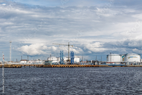 View from the sea and the Ventbunkers oil tanks. Ventbunkers is one of the leading oil product transshipment terminals in Ventspils port. Ventspils, Latvia - 13 Aug 2025