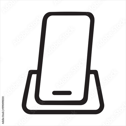 A black and white icon of a smartphone in a charging dock.