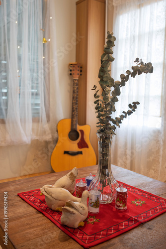 guitar in the corner of a cosy room
