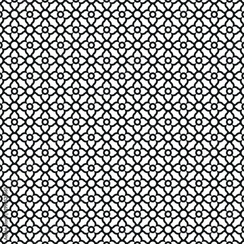 Black and white repeating geometric pattern featuring interconnected quatrefoil and circular motifs in a dense tessellation vector design
