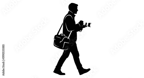 Silhouette of a photographer walking with a camera bag.