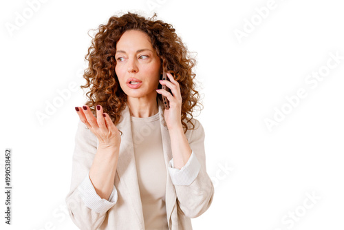 Obraz na plátně Mature woman having an important phone conversation, expressing concern and gest