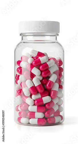 pink and white capsules in a clear bottle