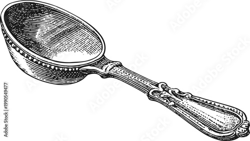 Vintage ornate silver spoon with engraved handle design isolated on white background