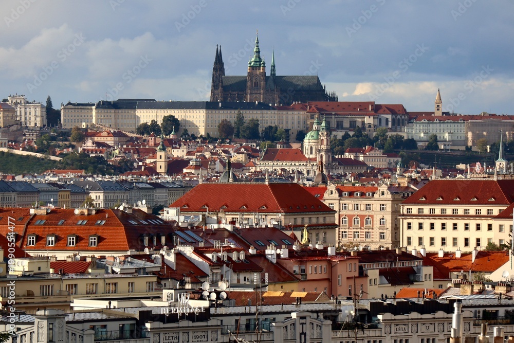 Obraz premium Prague Castle skyline with historic architecture and red rooftops in Czech Republic