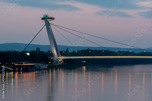Photography SNP Bridge with UFO observation tower over Danube River in Bratislava, Slovakia