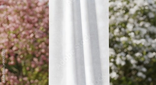 White Curtain Between Pink and White Flowering Bushes in Outdoor Garden