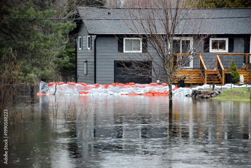 Fényképezés Flood waters along the Gull River threaten the village of Minden in the spring of 2026