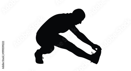 A man stretches preparing for exercise shown in dark silhouette