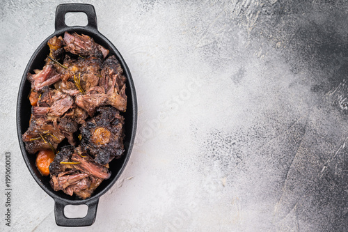 Tableau sur toile Homemade beef oxtail ragout in cast iron skillet, gelatin rich slow cooked meat